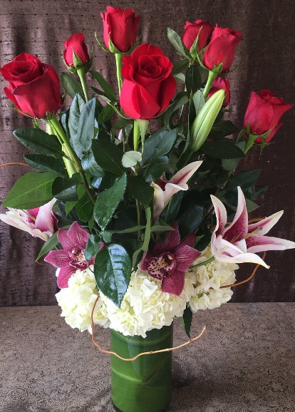 Dozen Red Roses with star gazer lilies and orchids